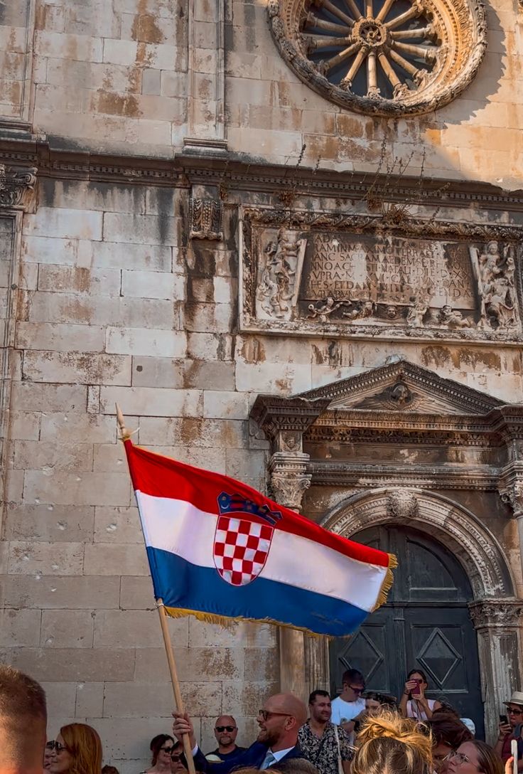 Croatian wedding flag decorated with ribbon and rosemary